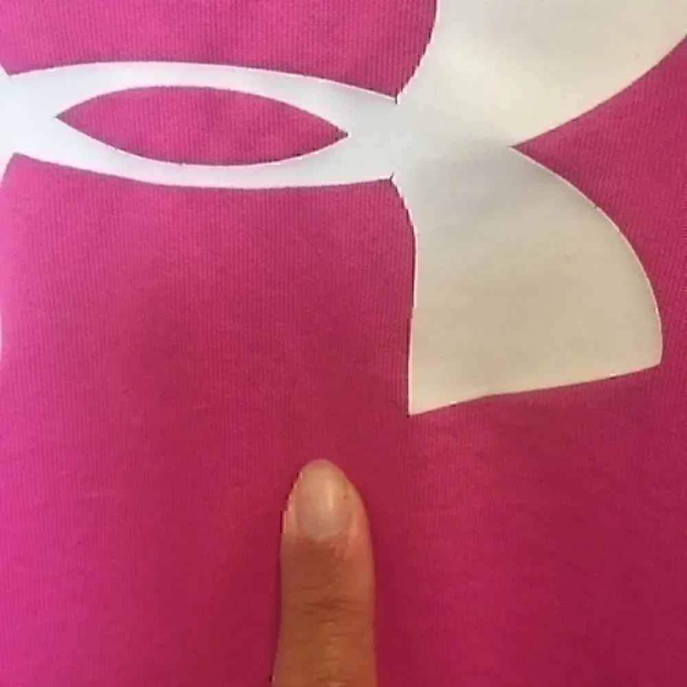Under Armour Girls size large  T-shirt